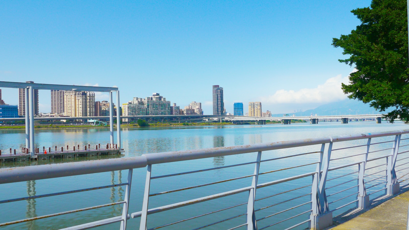 a view of a body of water with a city in the background